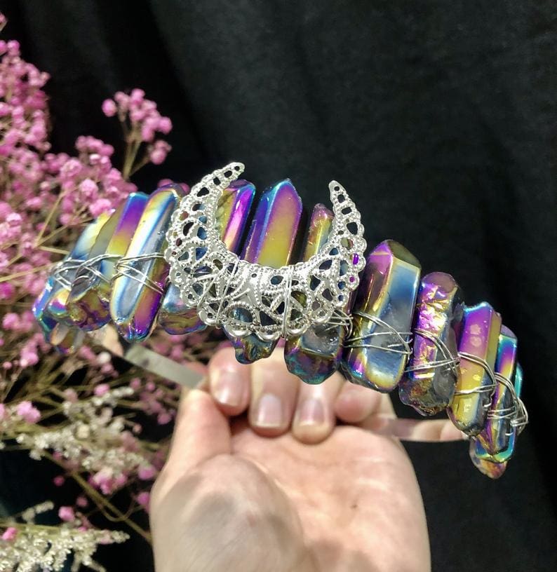 Rainbow aura point crown with an ornate silver-tone crescent and wrapped wire.