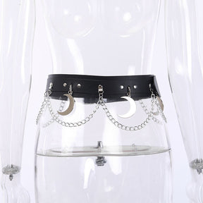 Back view of the black crescent moon belt on a clear mannequin, with hanging silver-tone moons and chains spread across the waist.
