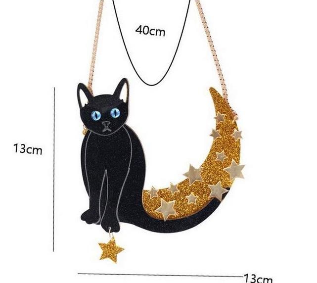 Measurement guide for the black cat and glitter moon necklace, labeling the pendant 13cm high and 13cm wide and the chain 40cm long.