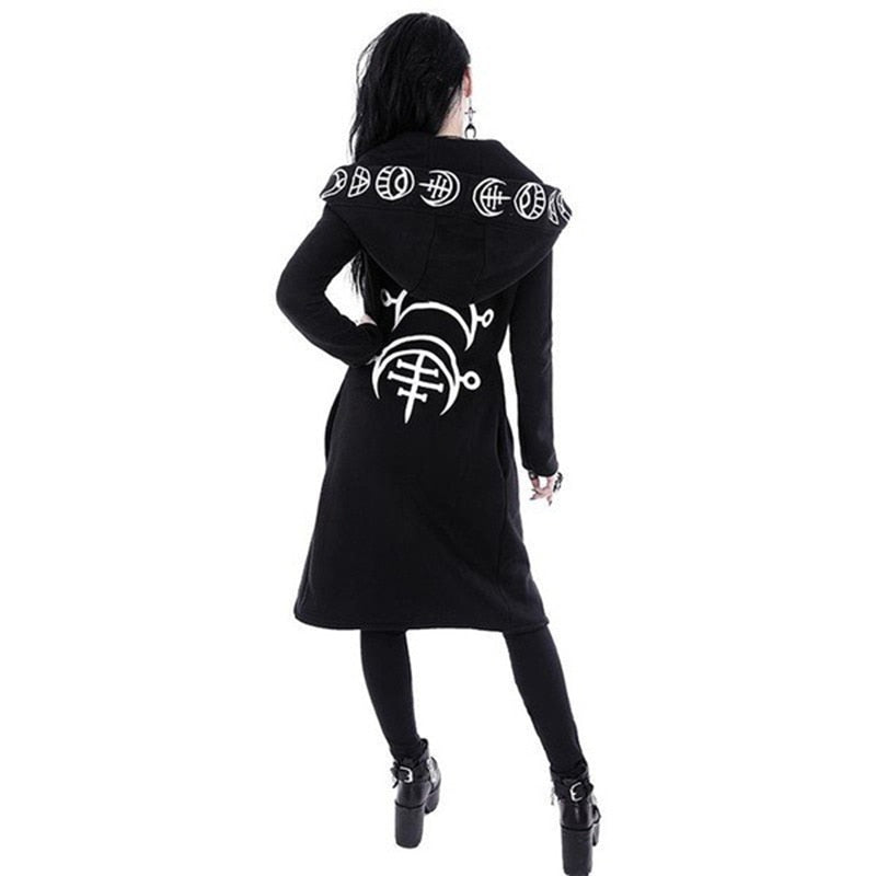 Back view of the black cardigan with the hood lowered, revealing a large white sigil on the back and a row of white symbols around the hood edge.
