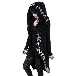 Angled view of the black hooded cardigan worn over a separate dark outfit, showing the printed white symbols and waterfall front points.