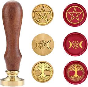 Three copper-coloured wax seal heads with a wooden handle and red wax samples, showing pentagram, triple moon and Tree of Life designs.