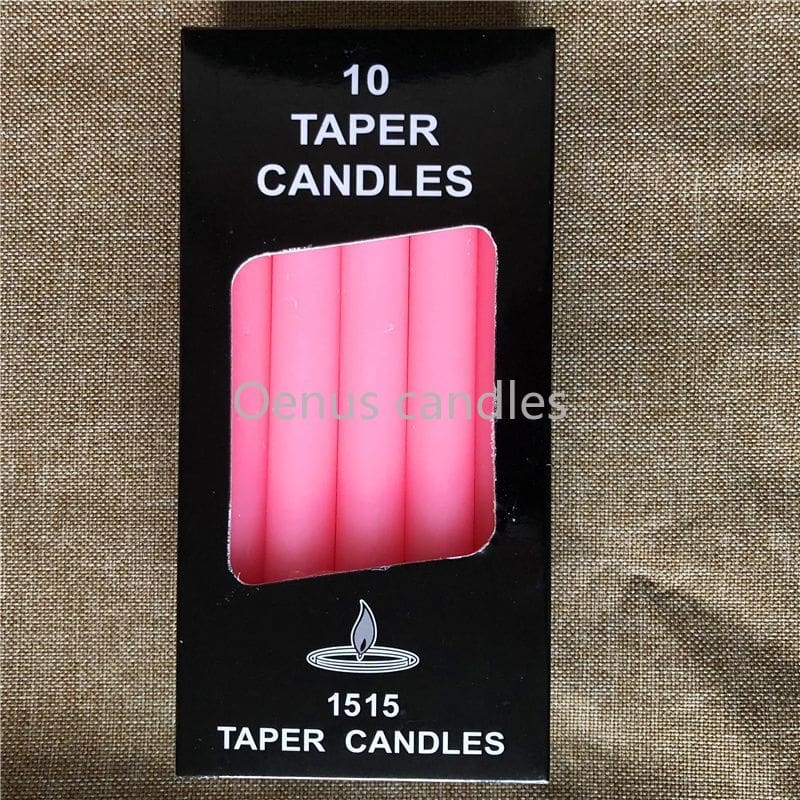Pink slender ritual candles displayed with their box, showing the candle colour and straight sides.