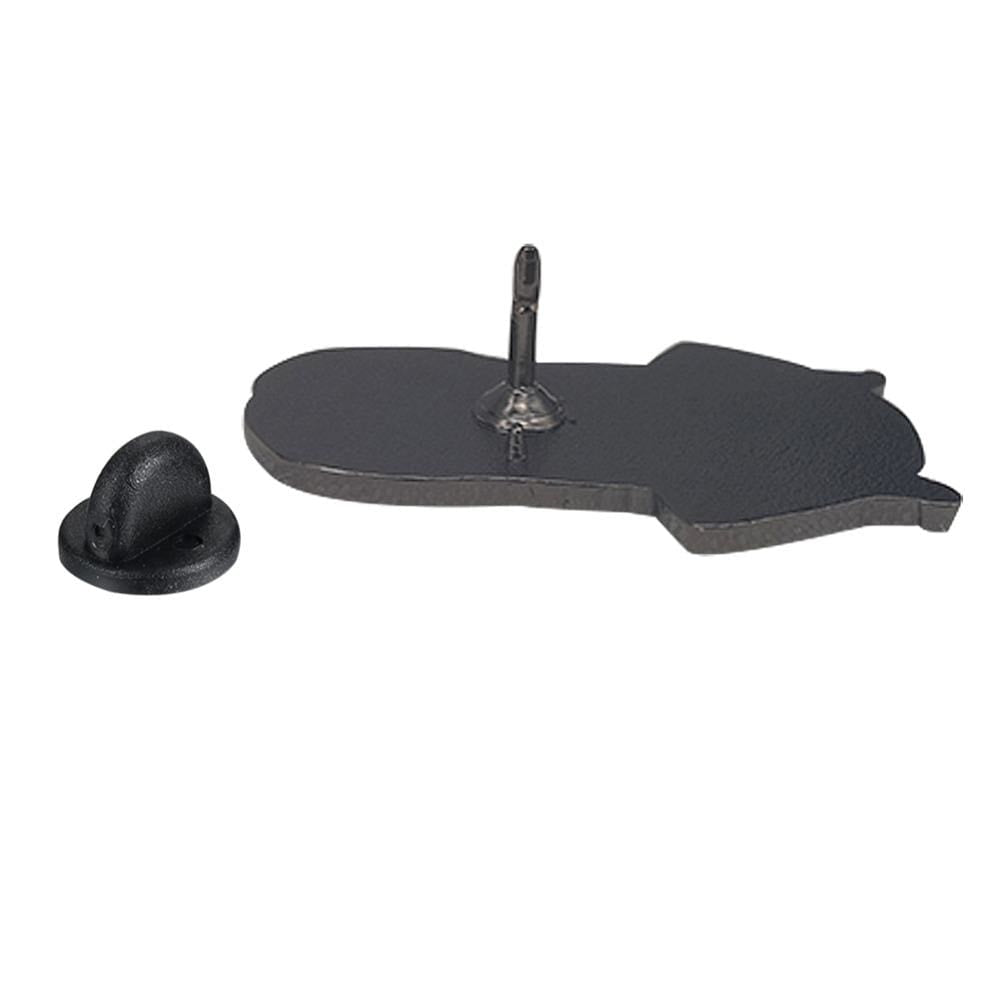 Side view of the dark reverse of the portrait pin, showing its single post and a separate black rubber-clutch backing on white.