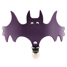 Purple bat-shaped garter with pointed wing tips, a matching band and silver-tone hardware.