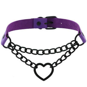Purple faux leather heart choker with black oval-link chains and an adjustable buckle, arranged in a circle on white.