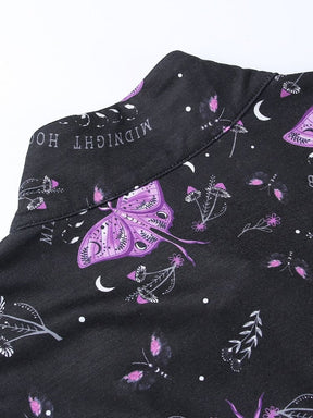 Upper back neckline of the black moth dress laid flat, showing the standing collar, central seam and purple wing print.
