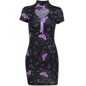 Closer isolated view of the black purple-moth dress, showing the standing collar, rounded chest opening and straight mini hem.