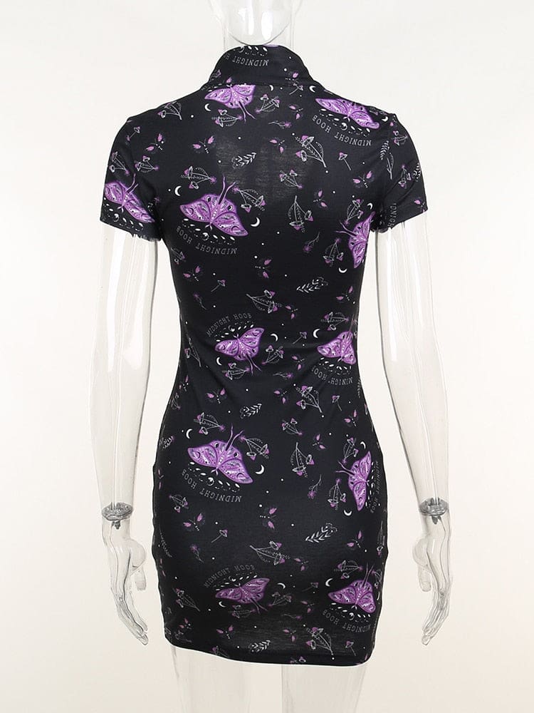 Rear view of the black and purple moth dress on a clear mannequin. The print continues across the closed back and short skirt.