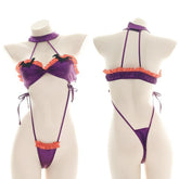 Purple and orange ruffled bat monokini with black bat embellishments, a matching neckband, and narrow side ties