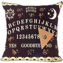 Deep purple square spirit-board pillow cover with pale alphabet rows, small zodiac symbols, sun and moon motifs, a printed planchette and a looping border.