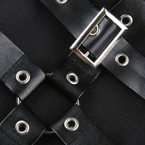 Leg warmer buckle and eyelet detail