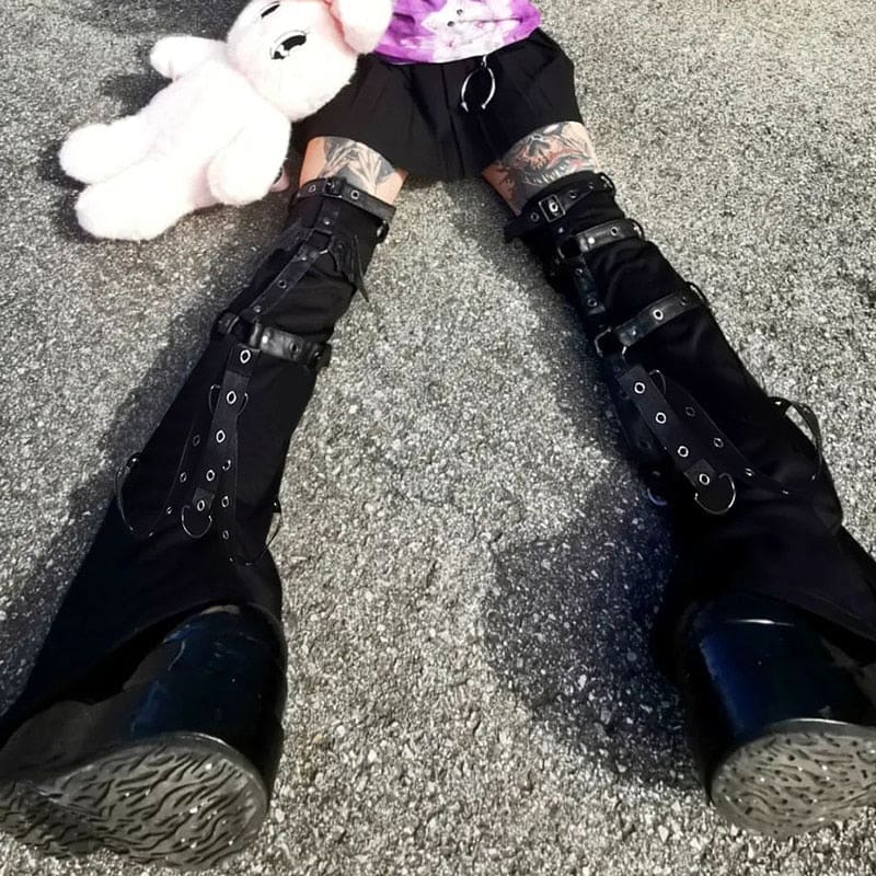 Black leg warmers seated side view