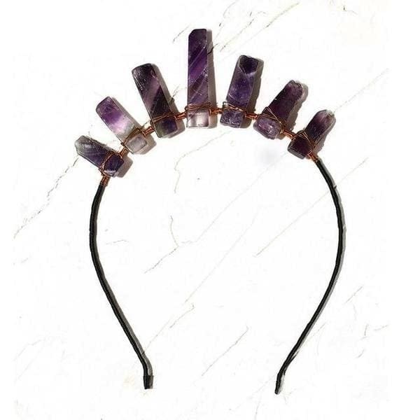 Amethyst crystal point tiara with an uneven row of purple points and copper wrapping on a dark open headband.
