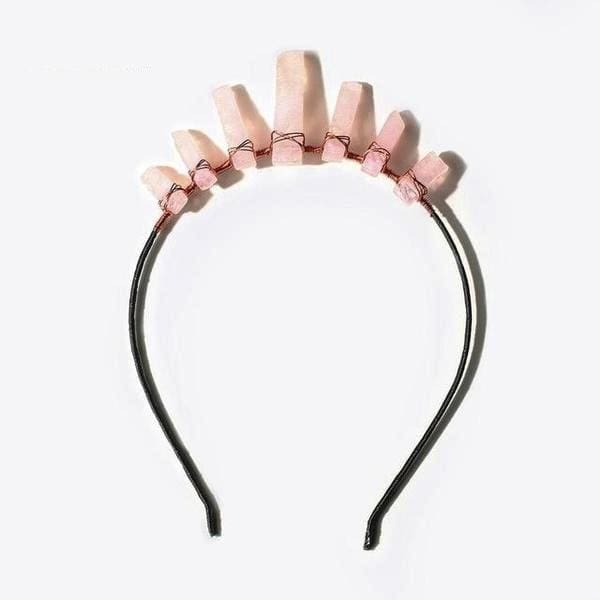 Pale pink quartz tiara with a taller central point and shorter points on either side, wrapped onto a dark headband.