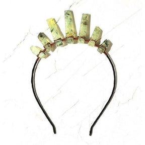 Smoky quartz tiara with pale earthy translucent points of varied heights along a dark headband.