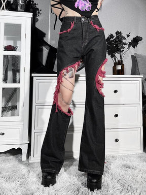 Alternate angled pose in the red and black flare jeans, emphasizing the contrasting frayed cutout edges against the washed denim.