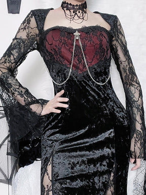 Red Moon gothic dress worn with one hand at the waist, showing a wine-red lace-covered bodice, silver-tone chains and black velvet skirt.