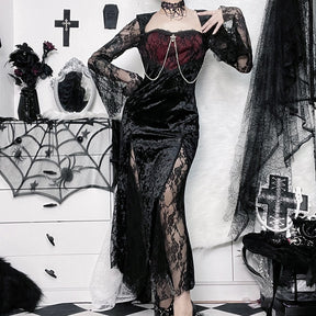 Front view of the Red Moon dress with one hand on the hip, displaying the shaped hem and lace skirt panels.
