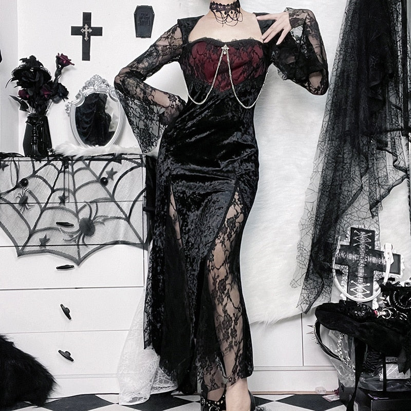 Front view of the Red Moon dress with one hand on the hip, displaying the shaped hem and lace skirt panels.