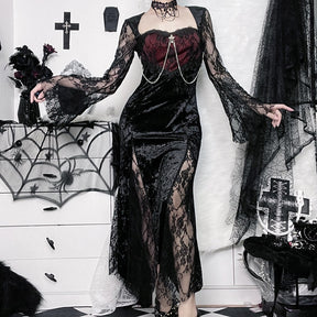 Red Moon dress worn with arms extended to show both floral lace bell sleeves and the fitted skirt.