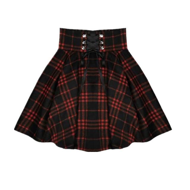 Red plaid mini skirt displayed alone, showing the wide lace-up waistband and flared shape.