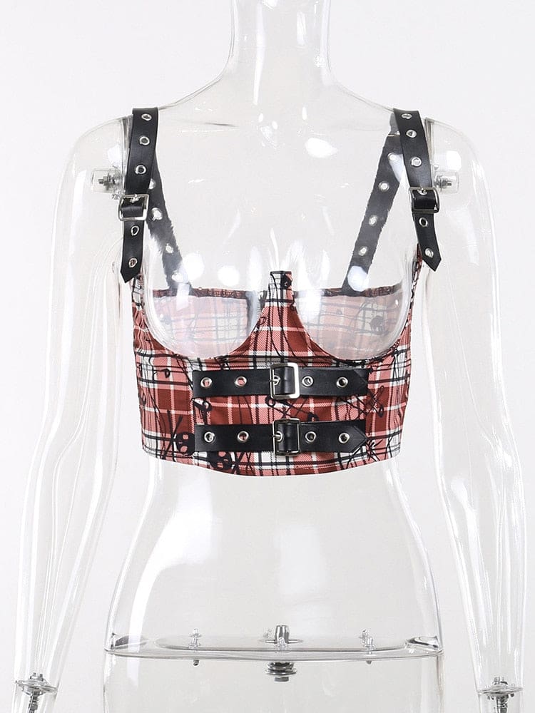 Red plaid underbust crop top on a clear mannequin, showing its deep open-bust cutouts, shoulder straps and three black front buckle bands.