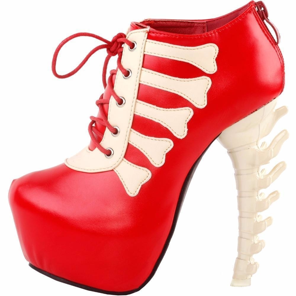 Red skeleton ankle boot in the opposite side view, showing the high platform, bone trim and rear zipper.