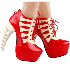 Red lace-up skeleton platform boots worn in a second angled view, showing both pale spine heels and the bone-shaped trim.