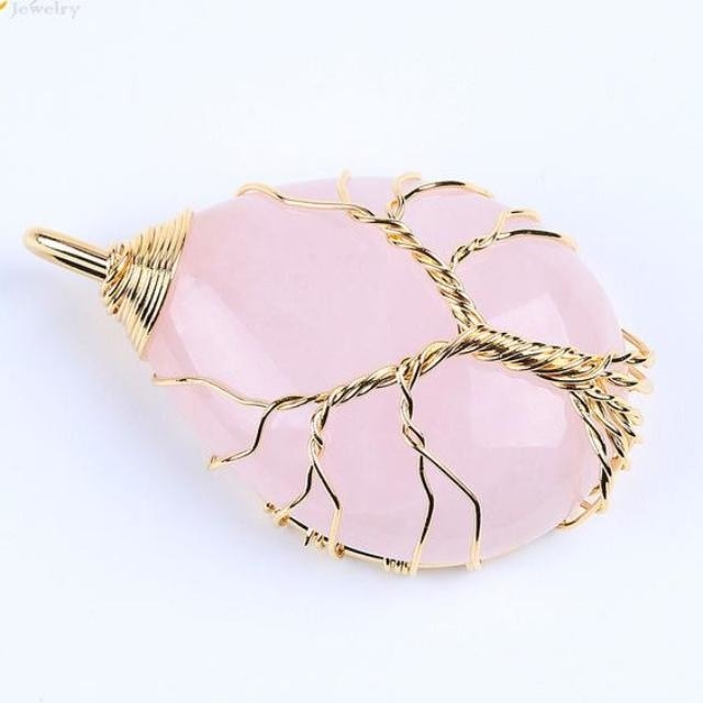 Rose quartz teardrop pendant with gold-tone branches and a twisted wire trunk.