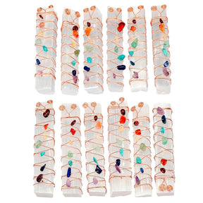 Additional copy of the grouped selenite wand photo, illustrating different irregular crystal accents on white copper-wrapped wands.