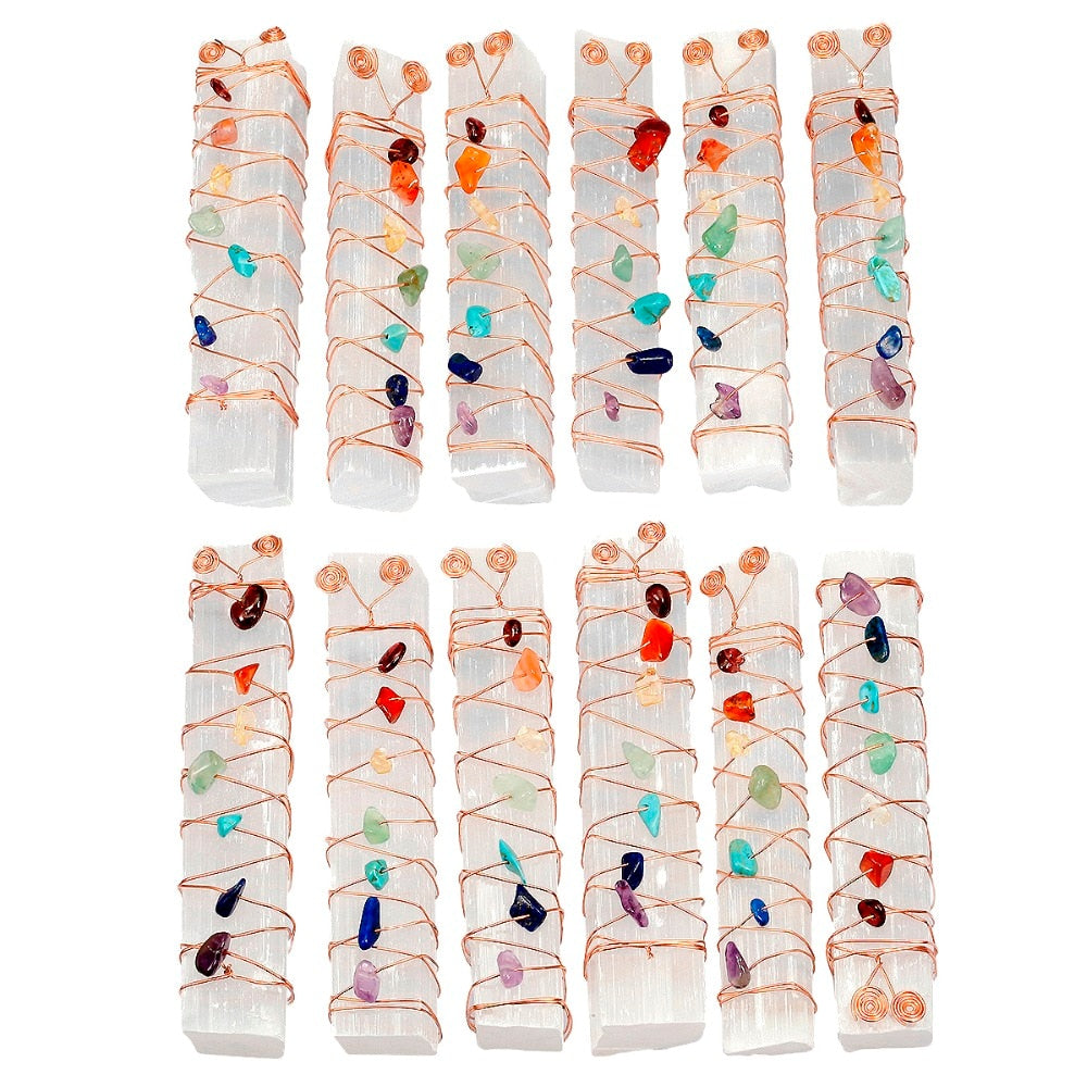 Group of copper-wrapped selenite wands showing variations in the sizes, colours and placement of their crystal accents.
