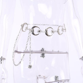 Angled clear-mannequin view of the linked crescent moon belt and its dangling starburst charm.