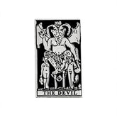 Silver-tone The Devil tarot card pin with fine figure details and a black background inside a narrow border.