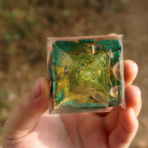 Overhead view of the malachite pyramid, with green canopy pieces forming a tree shape inside the clear outline.