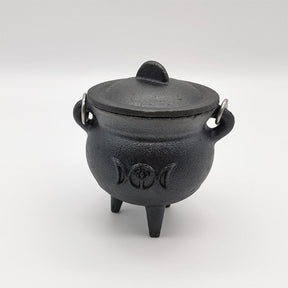 Closed cauldron with handle lowered