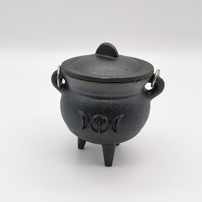 Closed cauldron with handle lowered