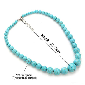 Turquoise bead choker diagram with a 23cm guide line and a separately marked 5cm extension chain.