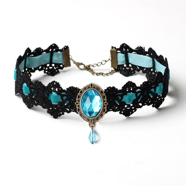Black lace choker with an ornate oval centerpiece and hanging teardrop in the Turquoise ribbon and jewel option.