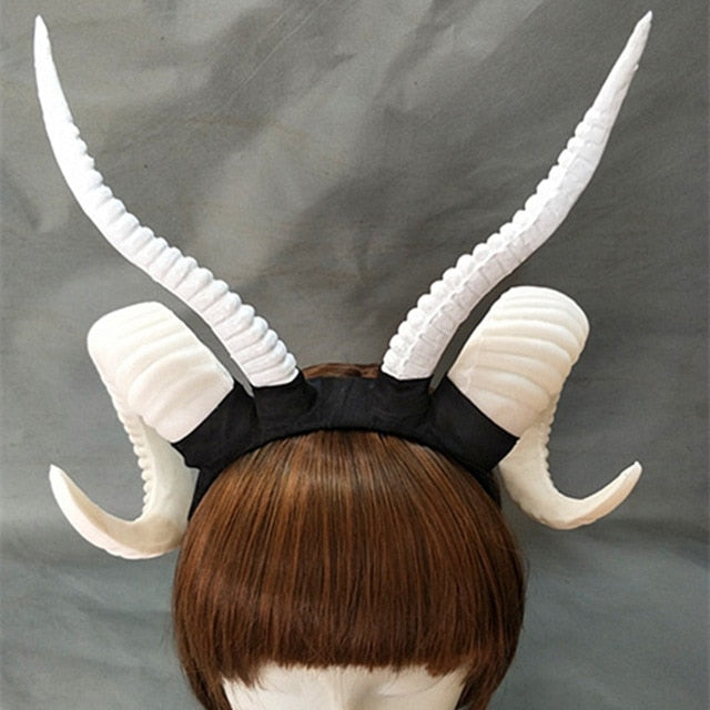 Demon horn headband in Plain White, displayed on a wig mannequin.