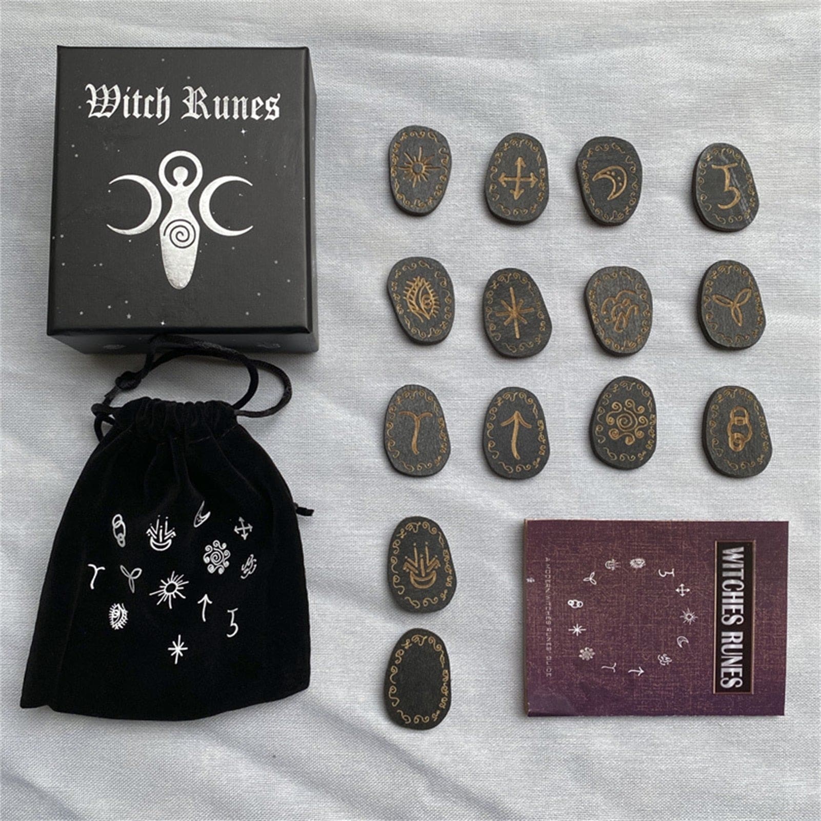 Fourteen rune tiles with blank tile and accessories