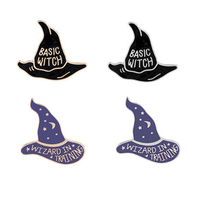 Four witch and wizard hat pins on white, with black Basic Witch hats beside purple Wizard in Training designs.
