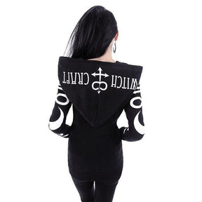 Back outfit view of the black hoodie, with Witch Craft lettering spread across the large hood and white symbols down the sleeves.