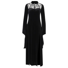 Front product view of the black velvet maxi gown on white, with lace shoulders, a high collar and draped sleeves.