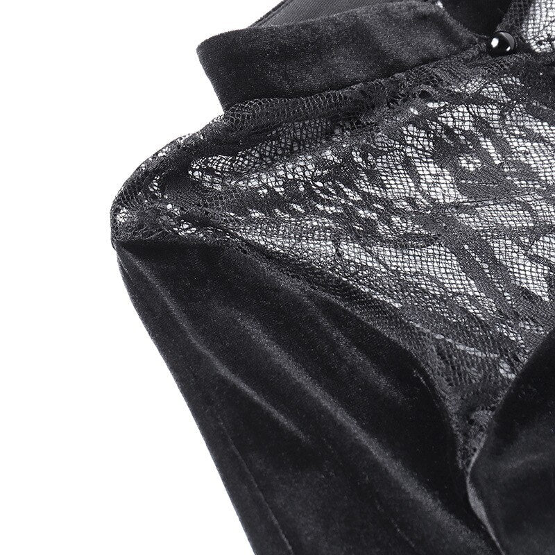 Detail of floral lace joining the velvet shoulder and collar, with seam finishing visible.