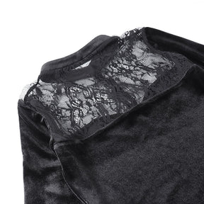The floral lace yoke laid flat between velvet panels, revealing the branching flower pattern.