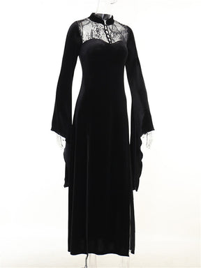 Black velvet gown on an angled mannequin, showing the high collar, lace upper panel and pointed sleeve ends.