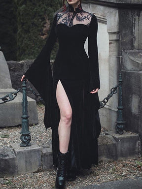 Front crop of the Witching gown outdoors, showing the sheer lace neckline, fitted velvet bodice and high skirt slit.