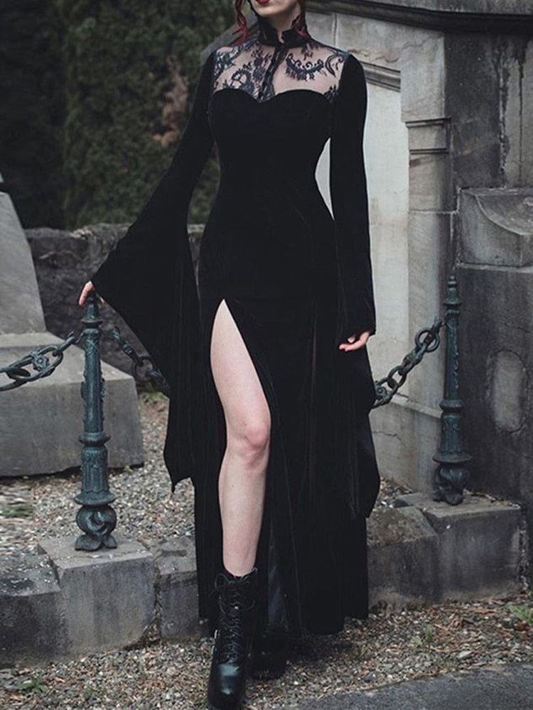 Front crop of the Witching gown outdoors, showing the sheer lace neckline, fitted velvet bodice and high skirt slit.