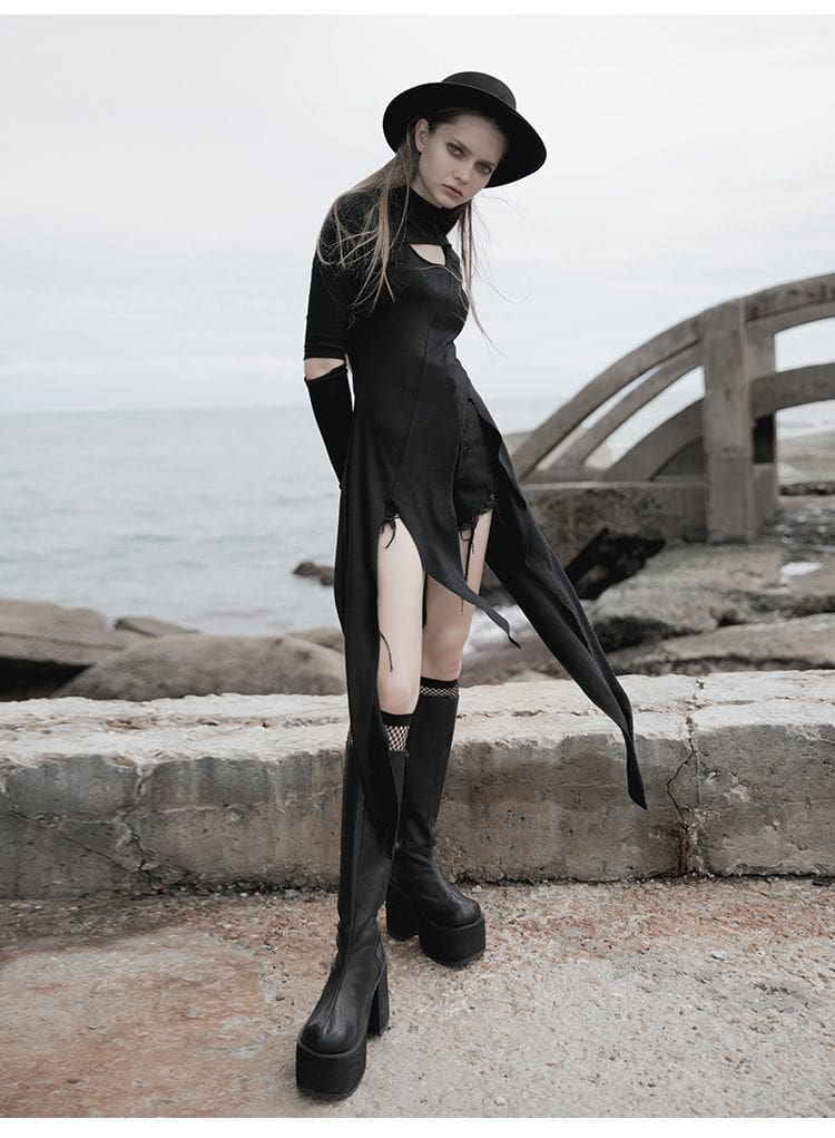 Three-quarter view of a black long-sleeve layering dress, showing its open lower front and separate shorts beneath the narrow hanging panels.